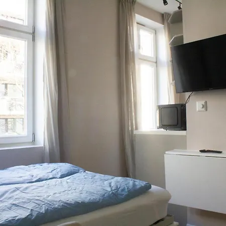 Апартаменты Sentrumsnaer Studioleilighet *